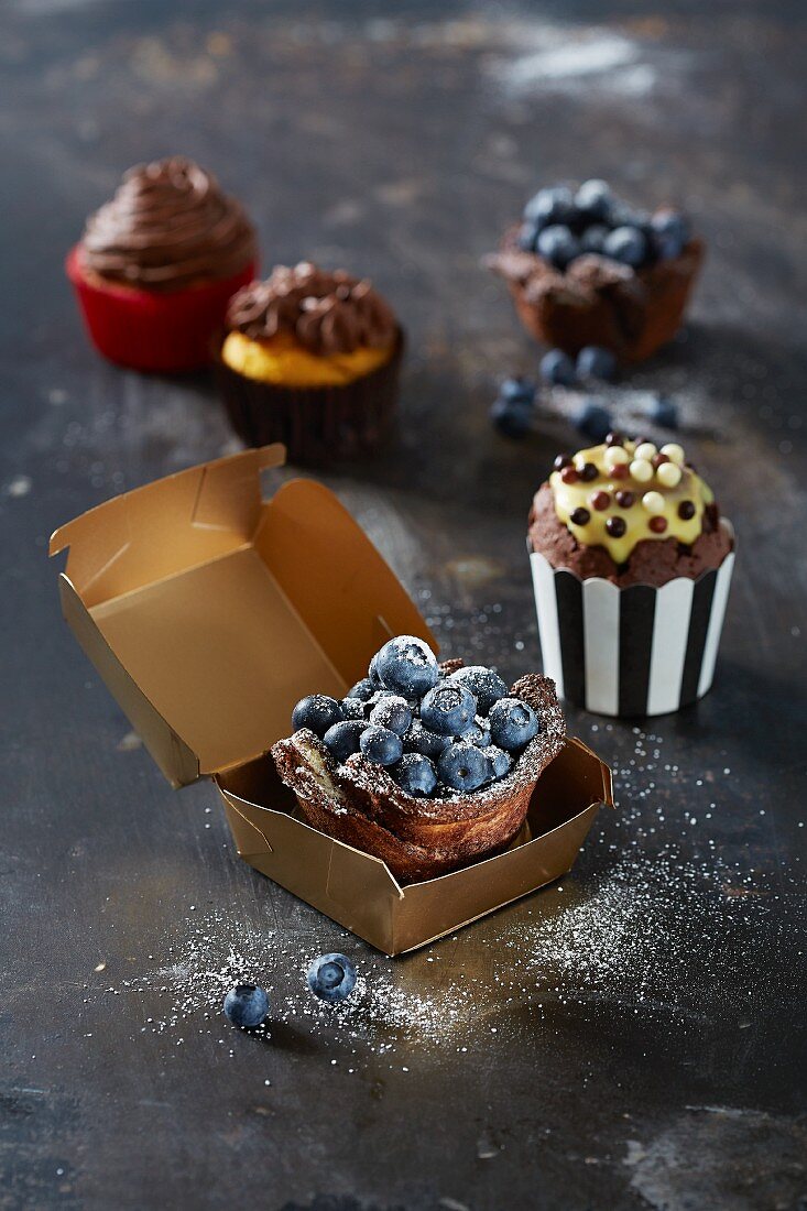 Cupcakes with chocolate and blueberries