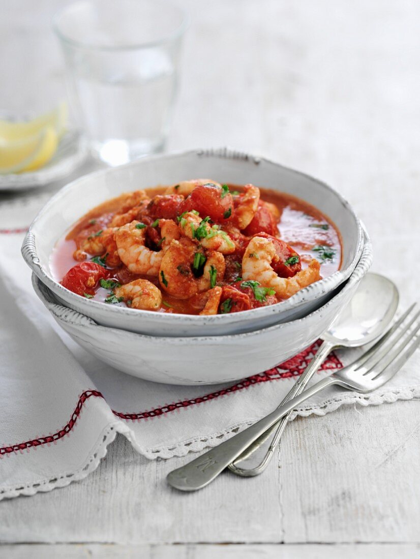 Tomato and prawn soup with parsley