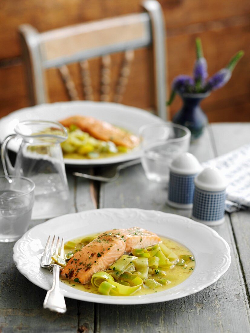 Salmon in a ginger and lemon sauce on a bed of leek