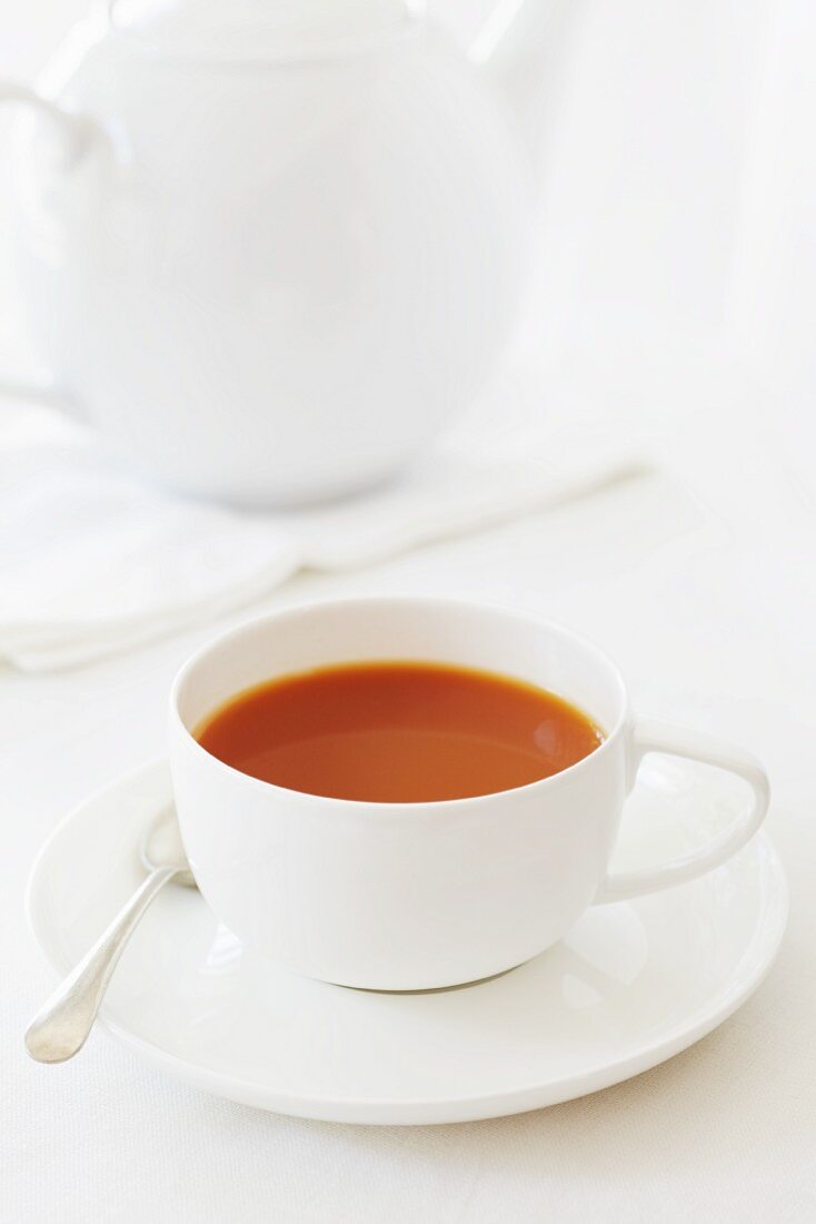 A cup of redbush tea with milk