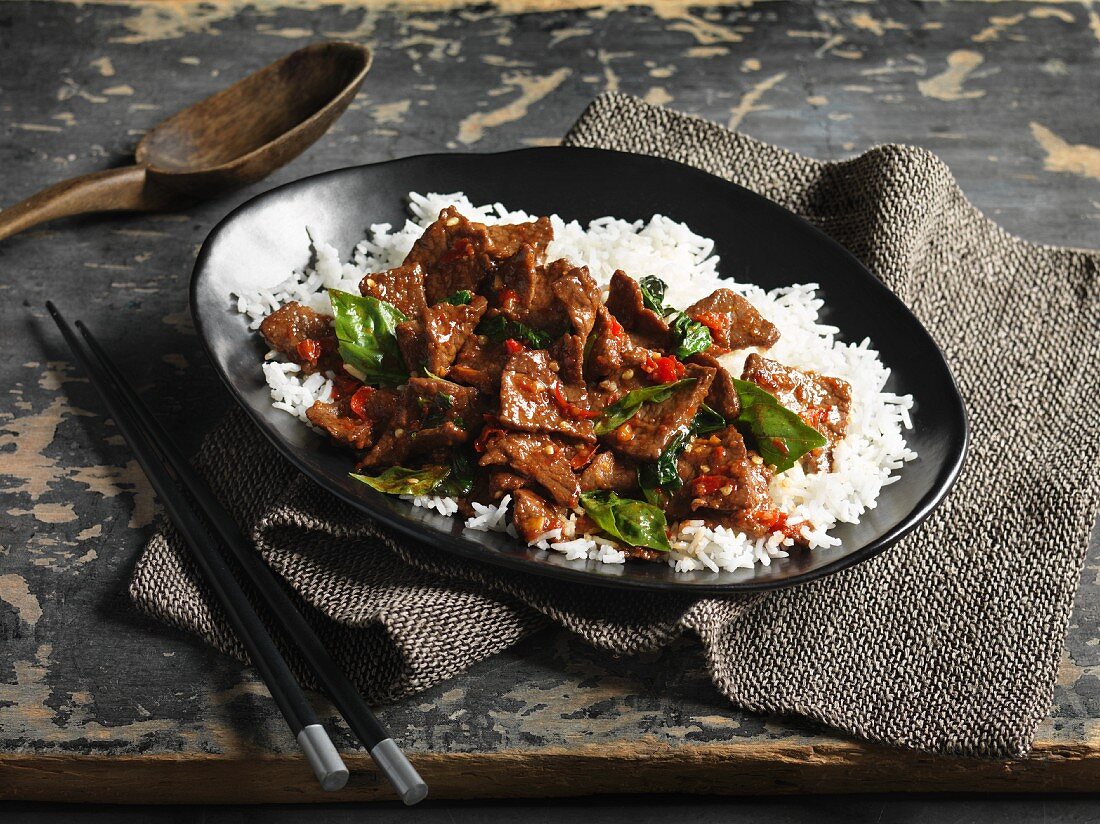Spicy beef with Thai basil on a bed of rice (Thailand)
