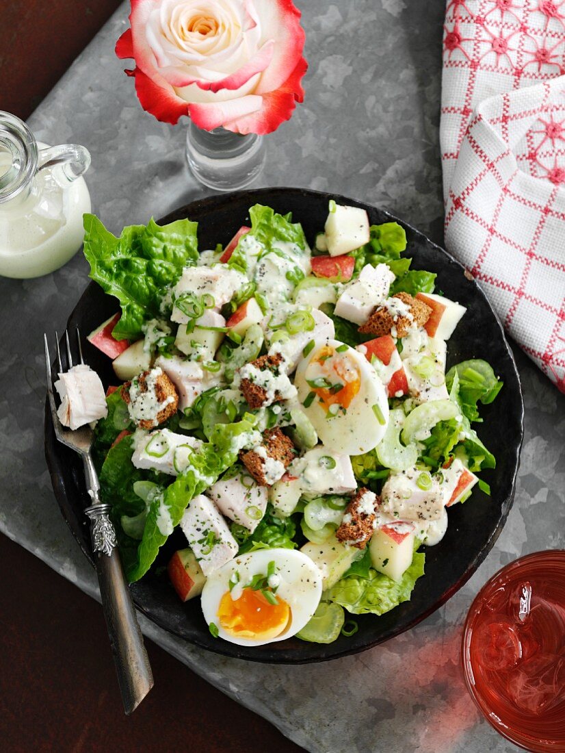 Caesar salad with hard-boiled eggs and croutons