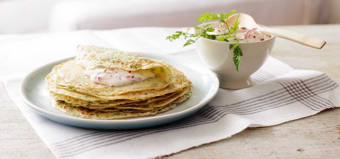 Wafer-thin chervil pancakes with radish sour cream