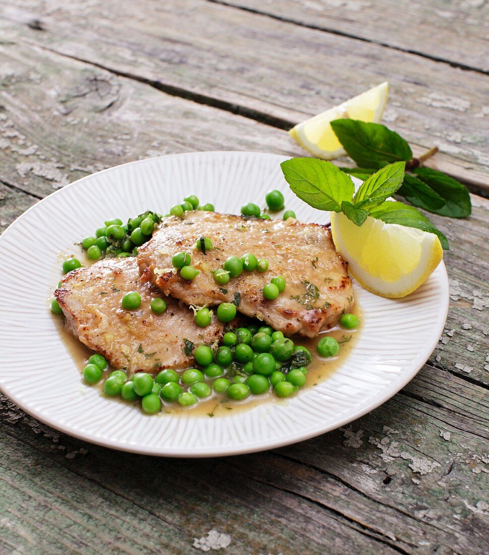 Veal escalopes with mint peas and a wine sauce