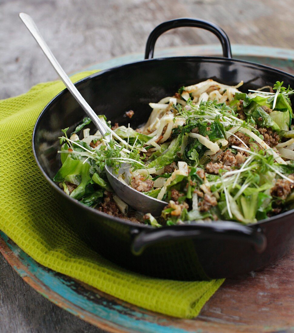 Black winter radish with minced meat and garden cress