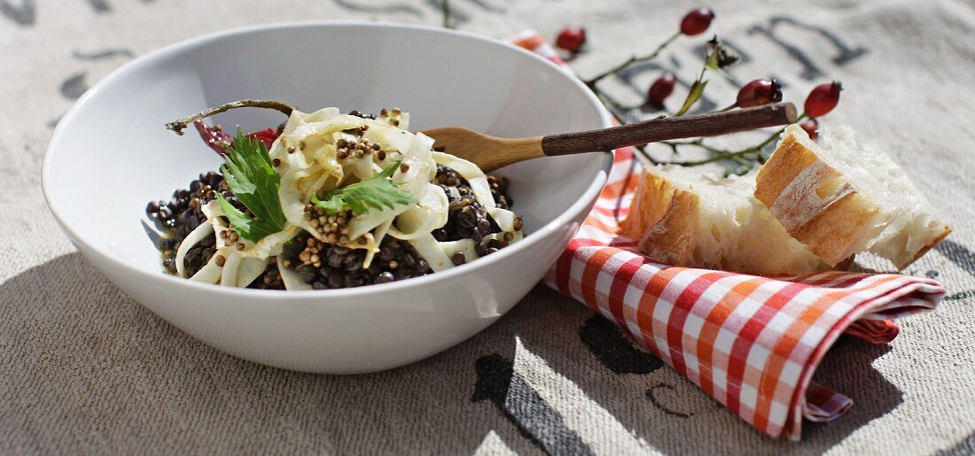 Warm lentil salad with chilli, honey and celeriac crisps