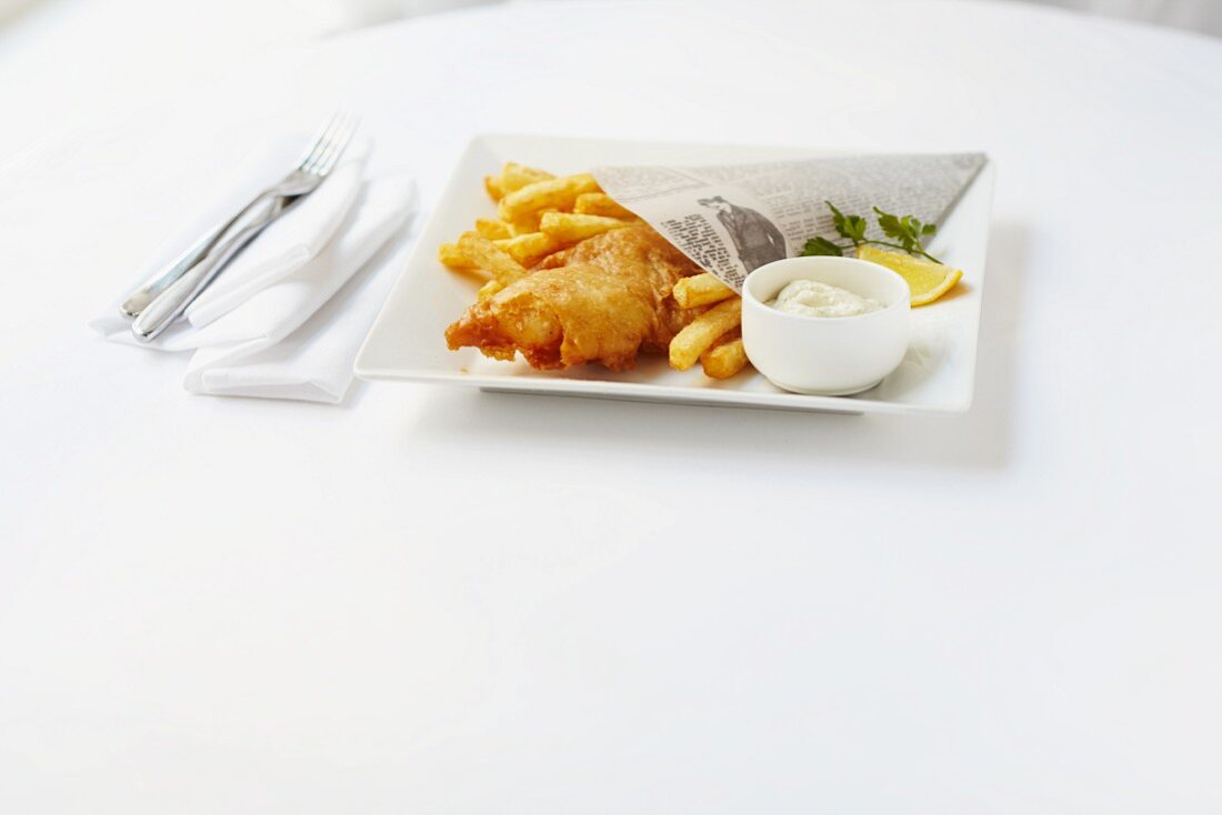 Fish with chips served in newspaper