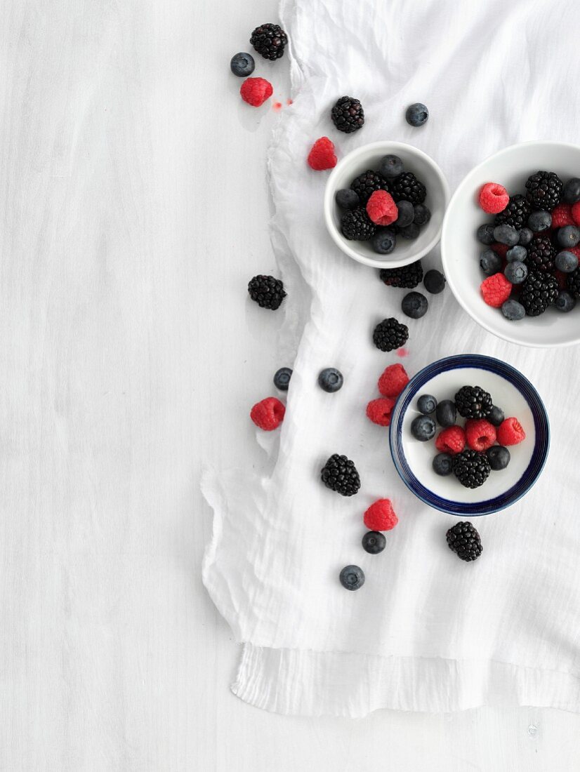 Bowls of fresh summer berries (seen from above)