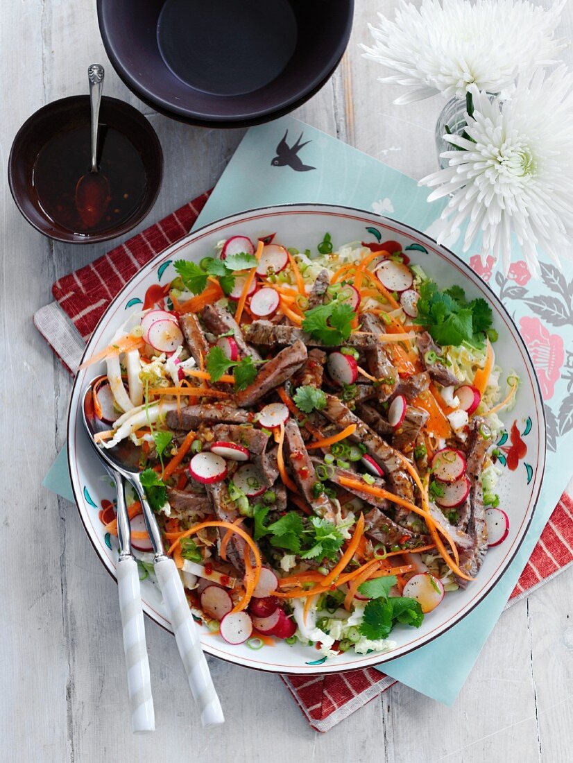Beef salad with carrots and radishes (Thailand)