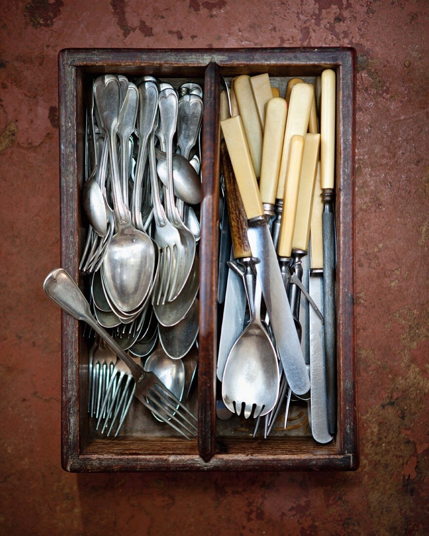 Antique cutlery in a cutlery drawer