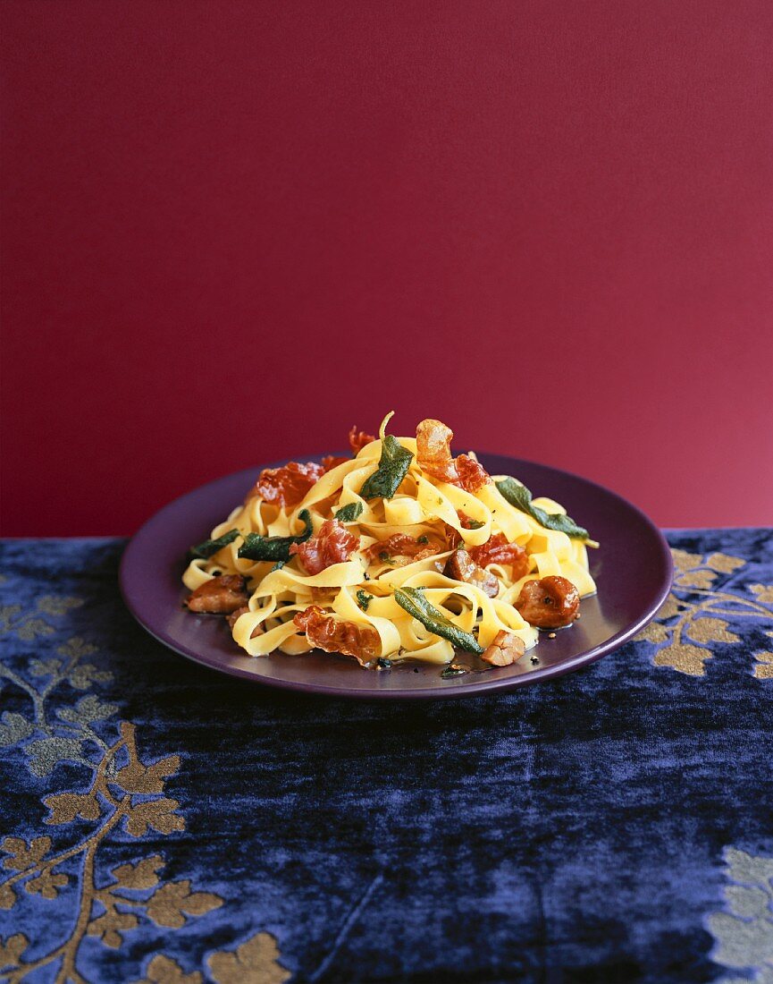 Tagliatelle with chestnuts, sage and crispy Para ham