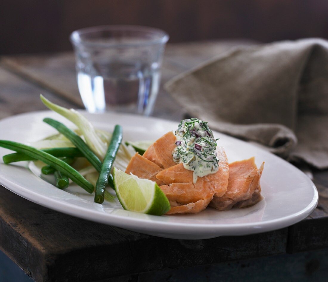 Poached salmon with a dill cream, green beans and fennel