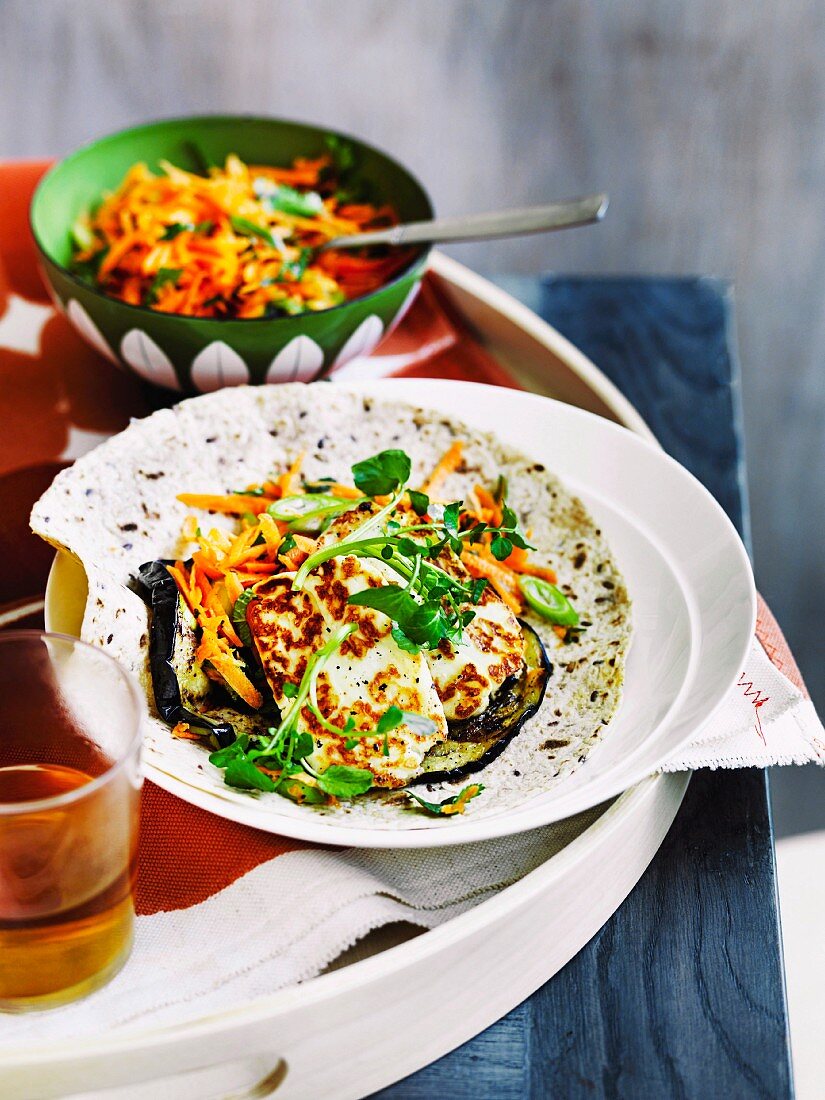 Haloumi and eggplant wraps with carrot salad