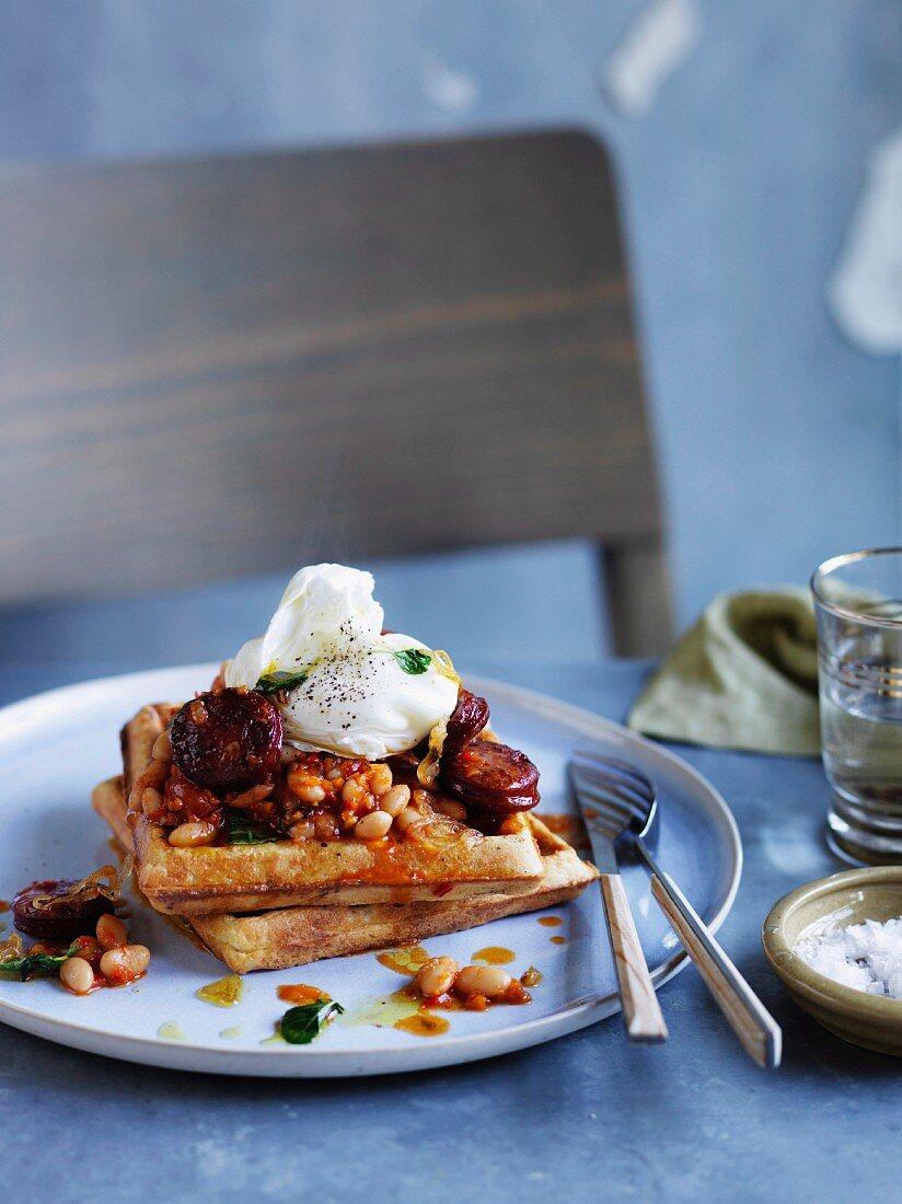 Wholemeal waffles with baked beans, chorizo and egg