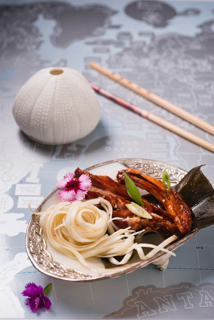 Udon noodles with spare ribs and seaweed