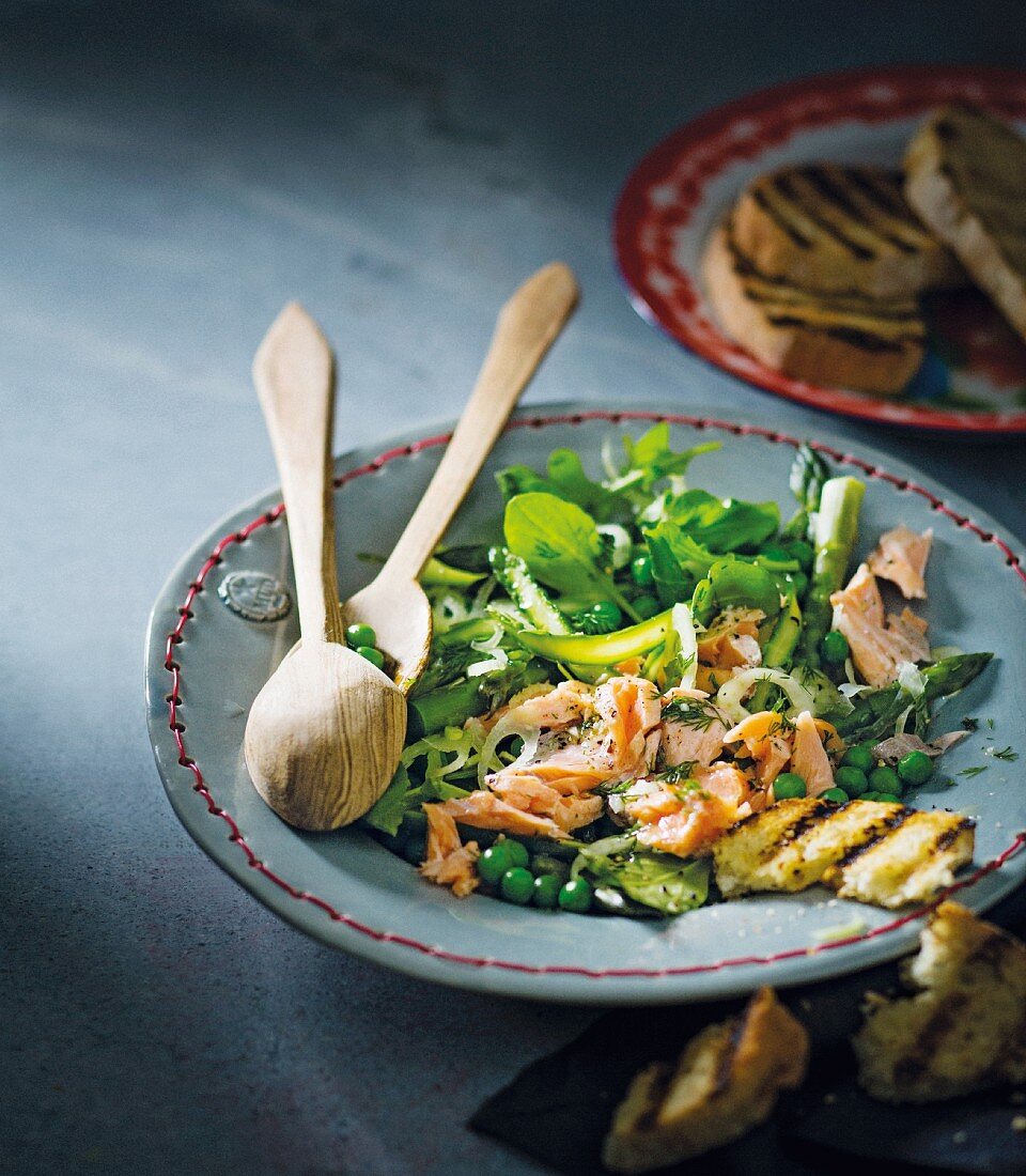 Green vegetables salad with grilled salmon