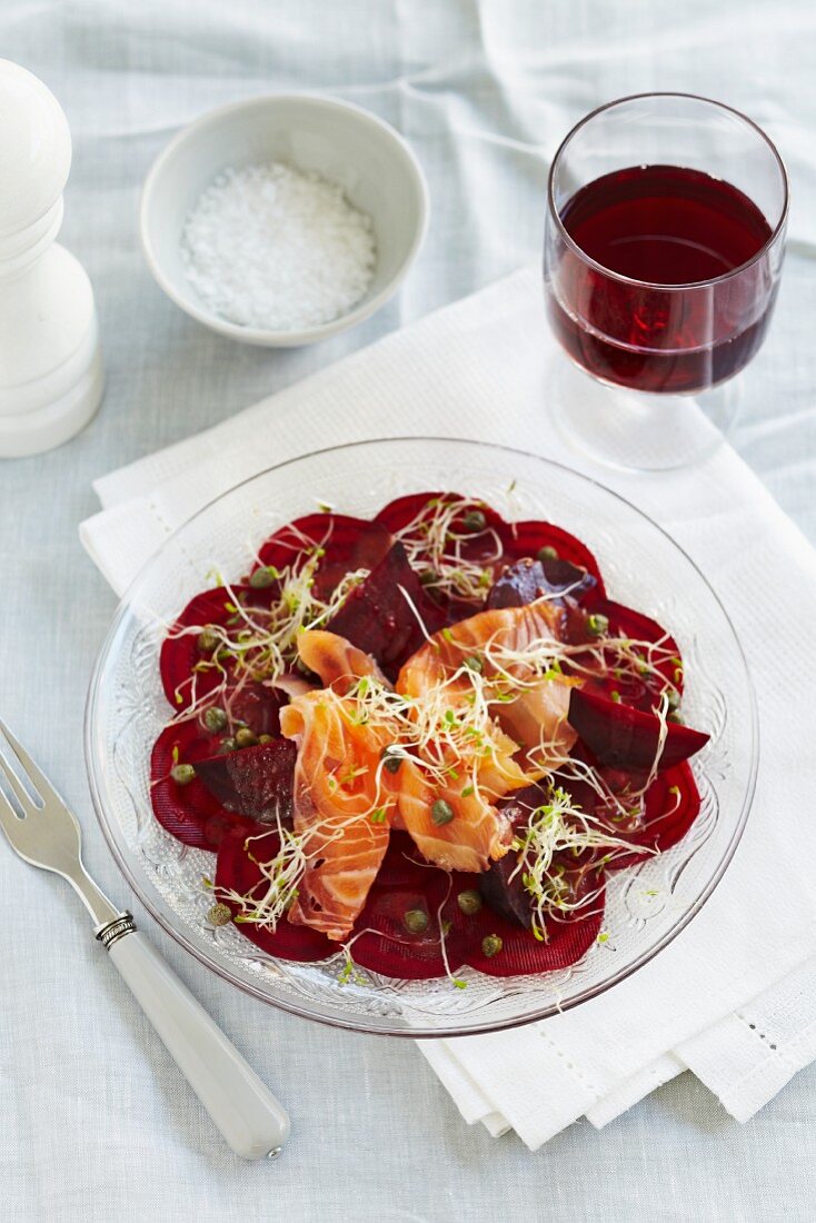 Beetroot carpaccio with smoked salmon, cress and capers