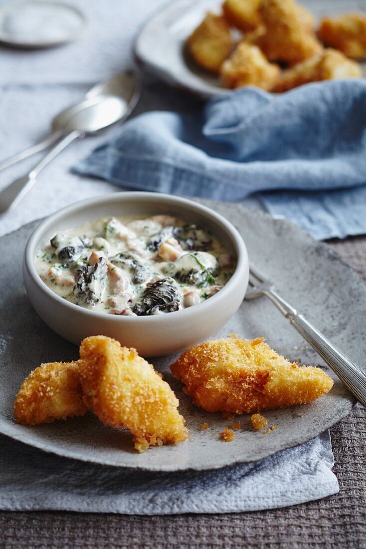 Breaded fish steaks with chowder
