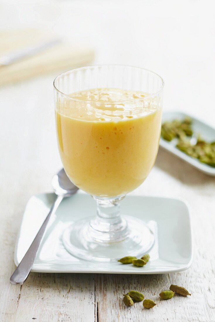 Orange and cardamom milk pudding in a dessert glass