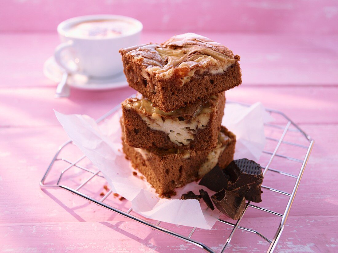 A stack of brownies on a wire rack