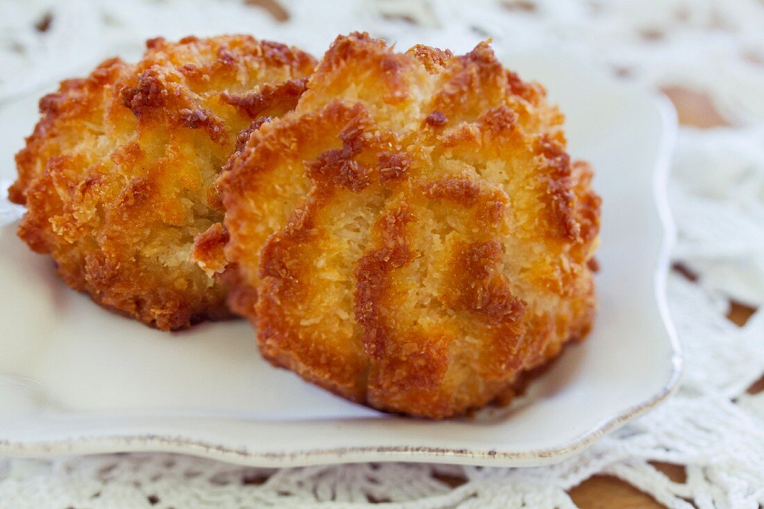 Two coconut macaroons on a plate