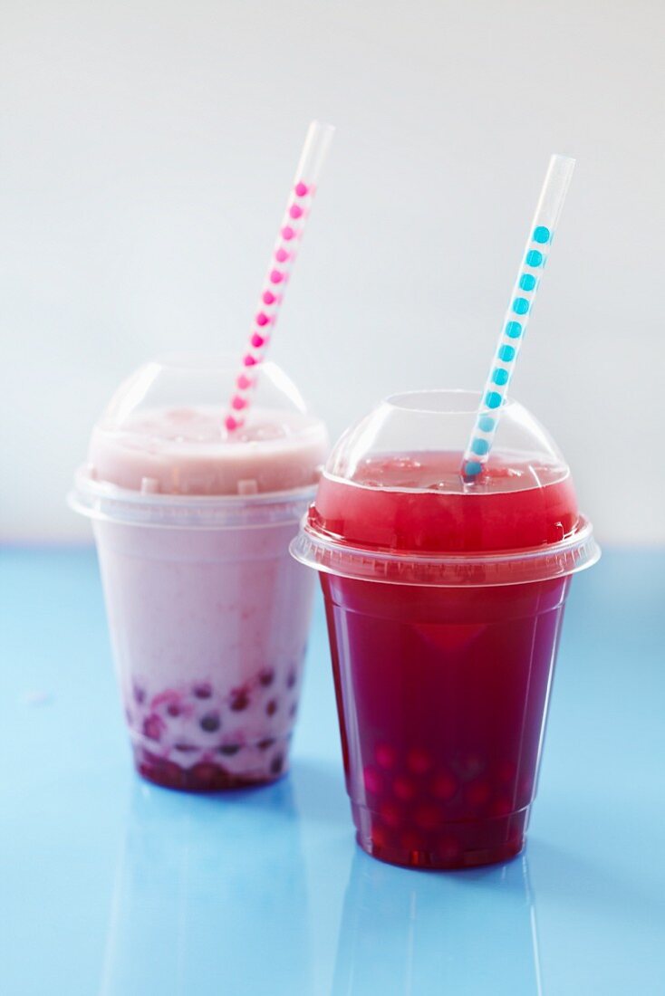 Fruit bubble tea with tapioca pearls in plastic cups