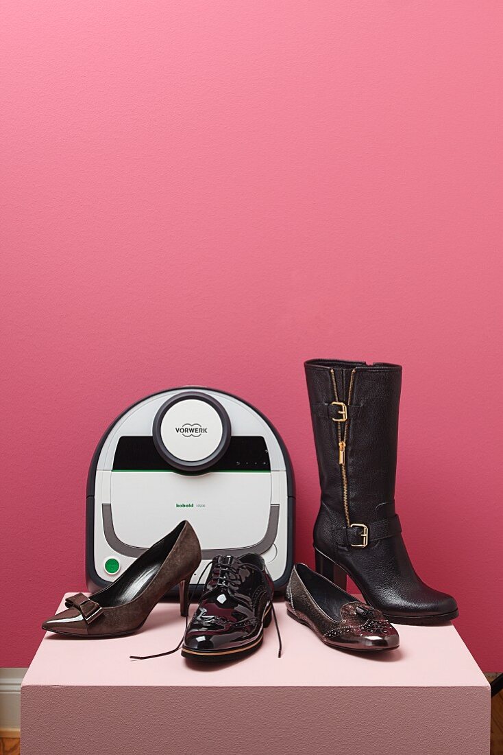 Shoes and a robot vacuum cleaner