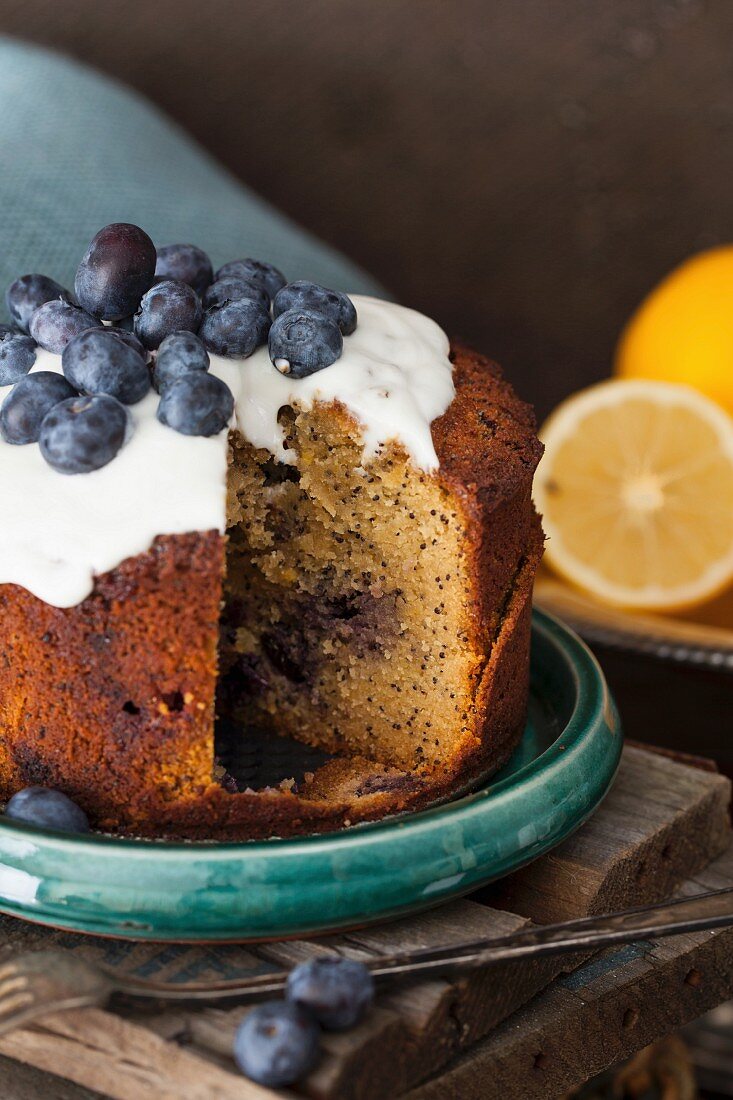 Lemon and blueberry cake with poppy seeds, sliced