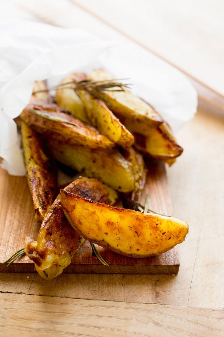 Roasted potato wedges in paper