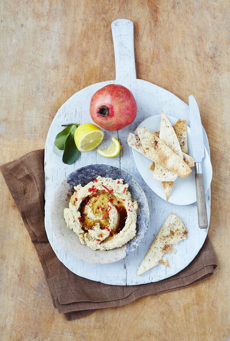 Hummus with a pomegranate balsamic dressing