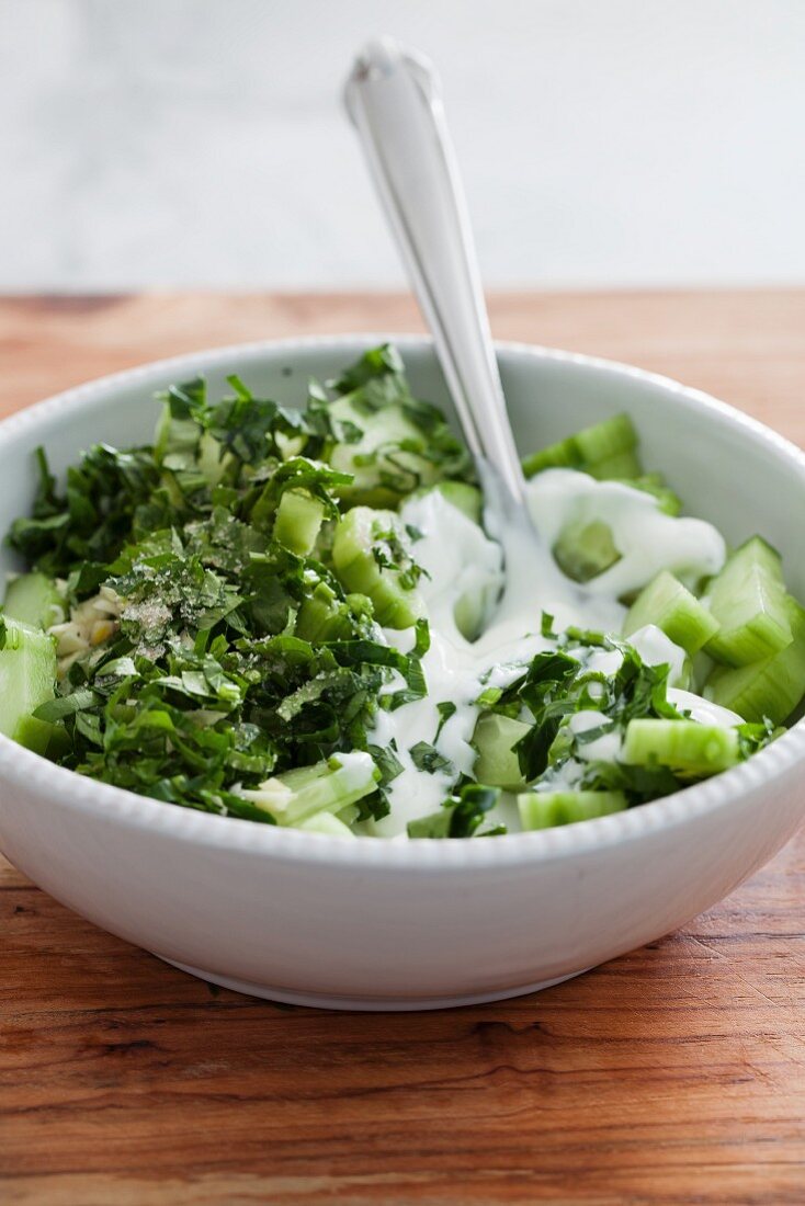 Cucumber salad with fresh parsley, garlic and yoghurt