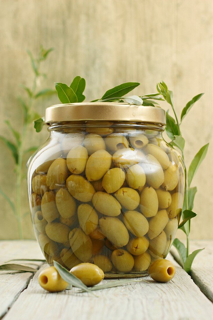 A jar of green olives