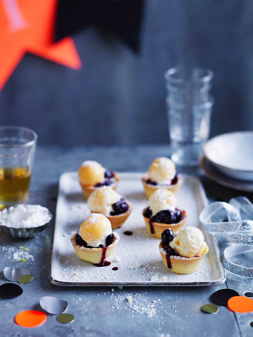 Mini blueberry pies with lemon curd ice-cream and sherbert