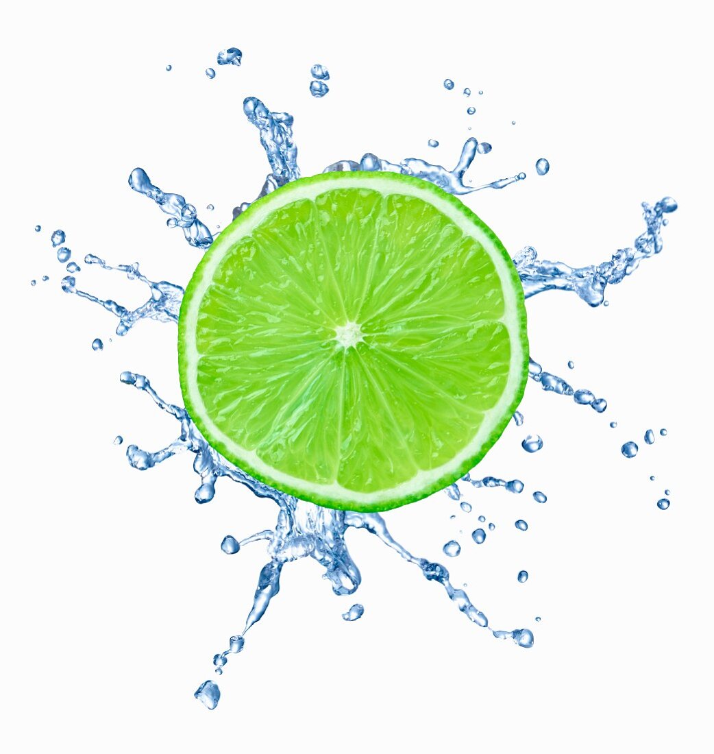 A slice of lime with splash of water