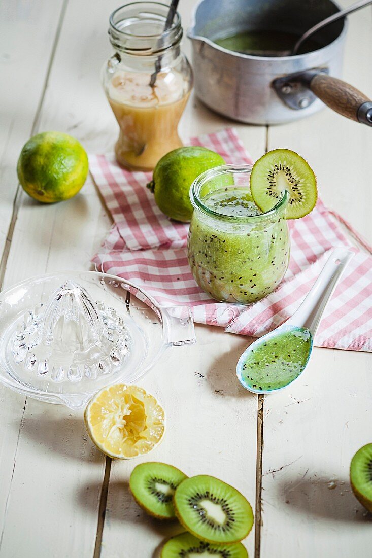 Cold kiwi soup in a glass with limes and honey