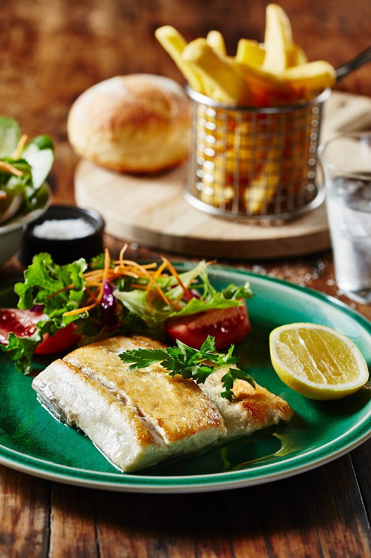 Barramundi fillet with salad and chips