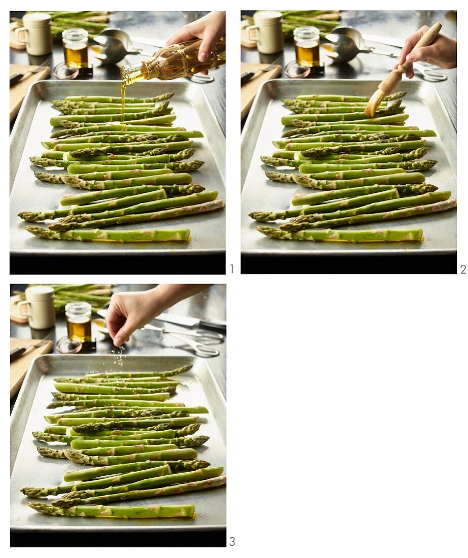 Organic asparagus with olive oil and sea salt being prepared for roasting