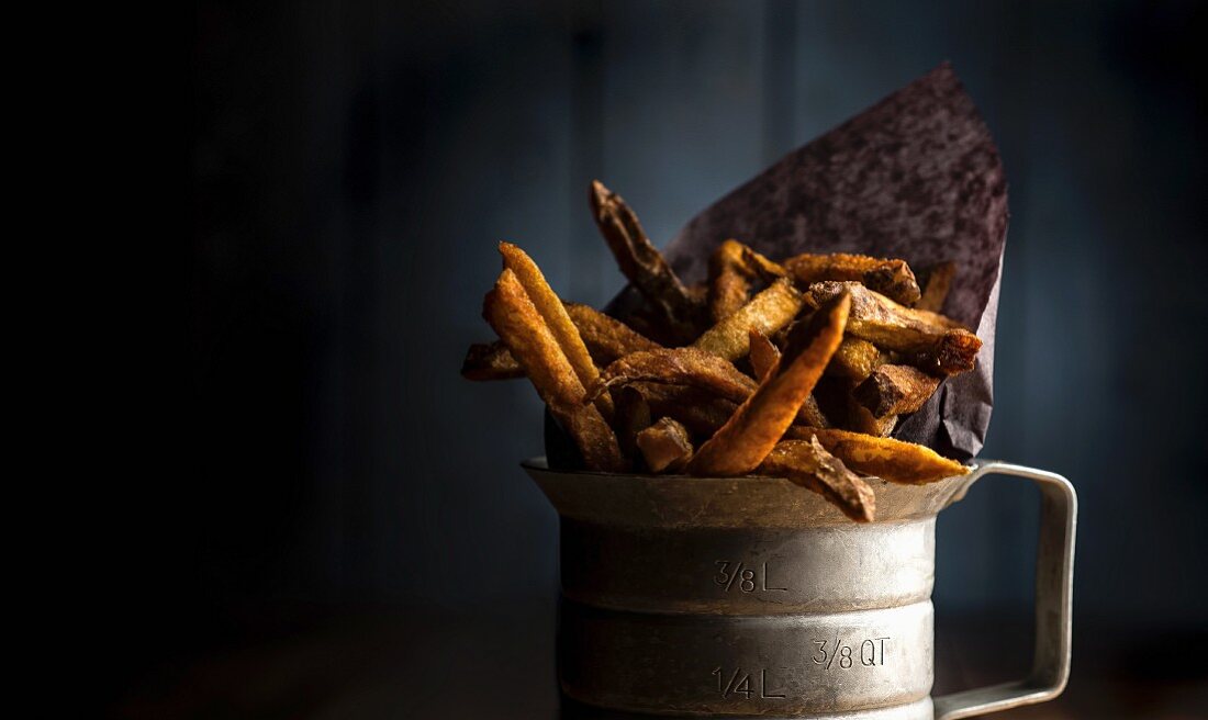 Chips in a vintage measuring cup