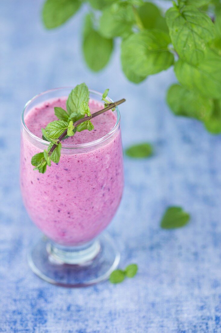 Pink berry smoothie with fresh mint