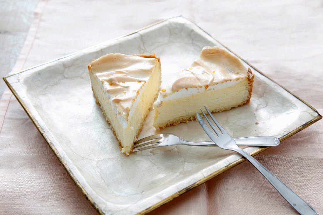 Two slices of meringue cheesecake