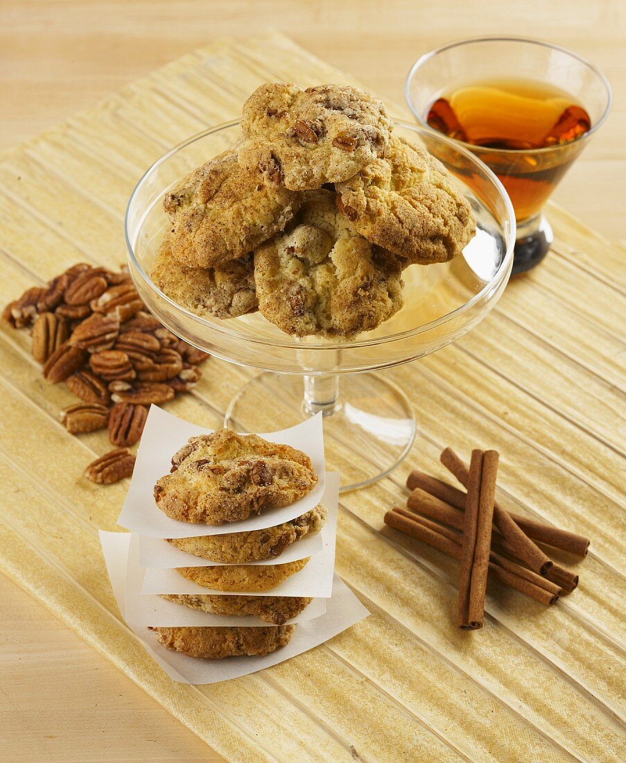 Pecan nut and cinnamon cookies with a glass of whiskey