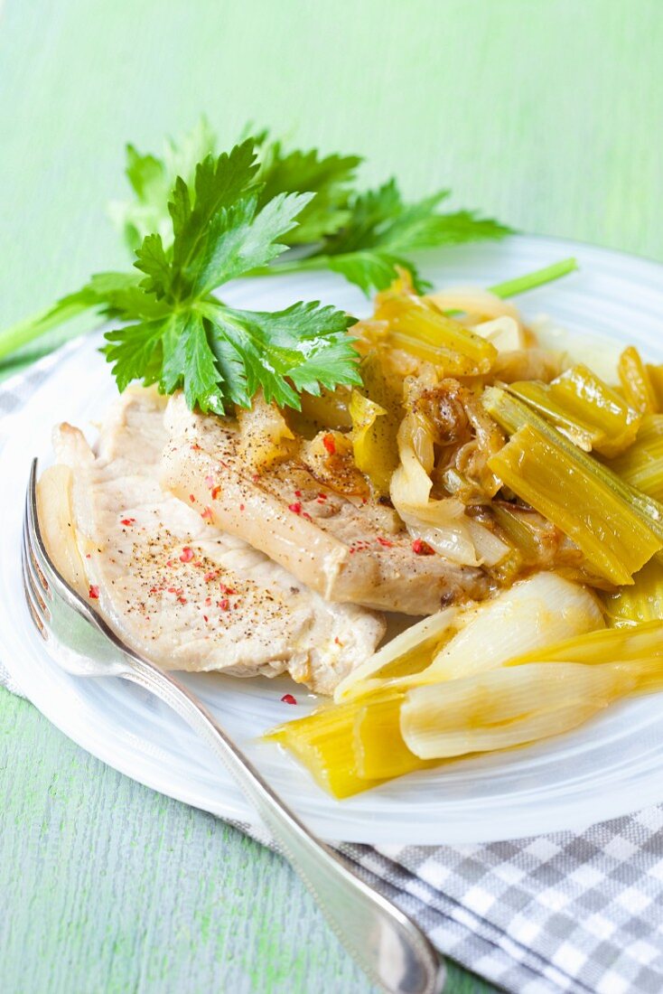 Pork with celery and spring onions