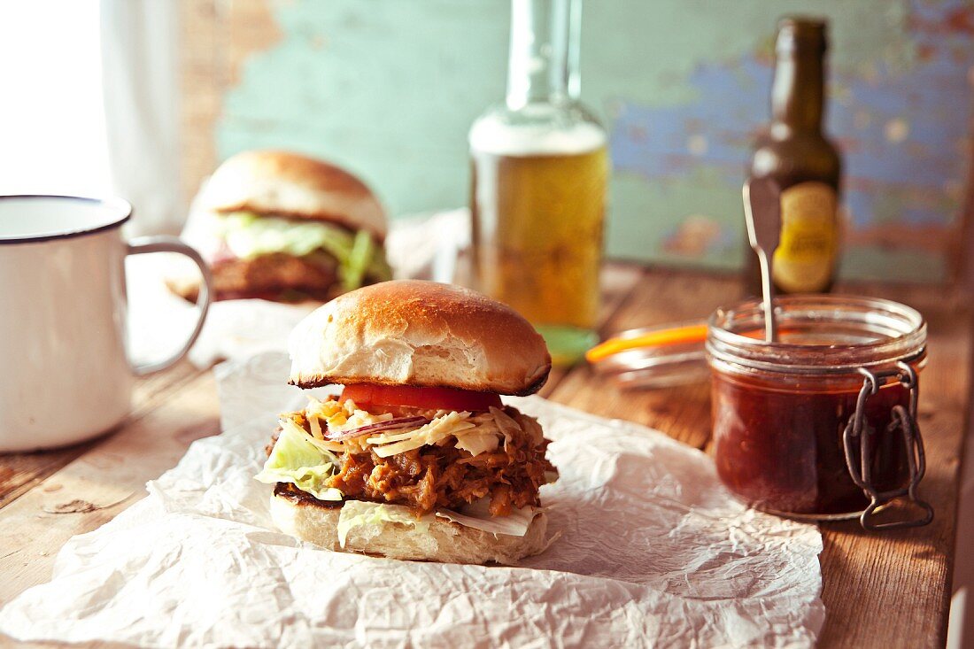 A pulledpork slider with BBQ sauce and apple coleslaw