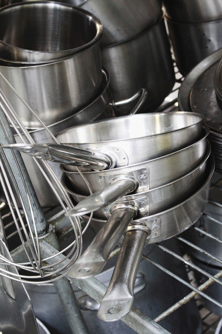 Various pots and pans in a commercial kitchen