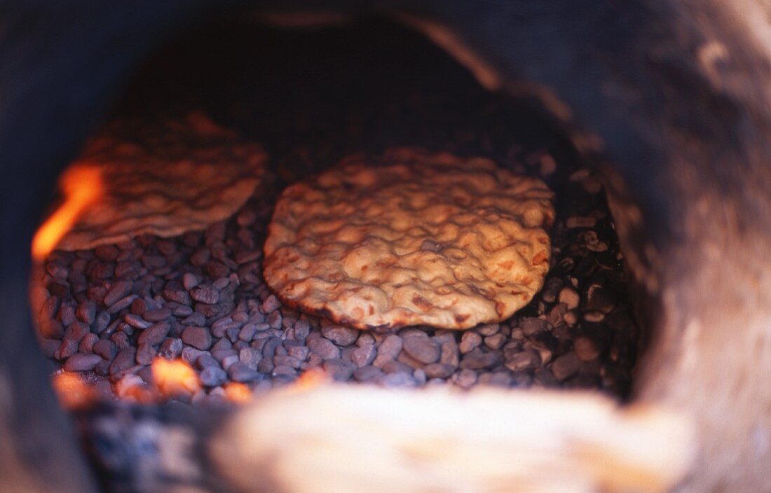 Unleavened bread in an oven (Morocco)