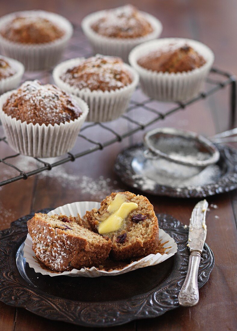 Bran muffins with cranberries and butter