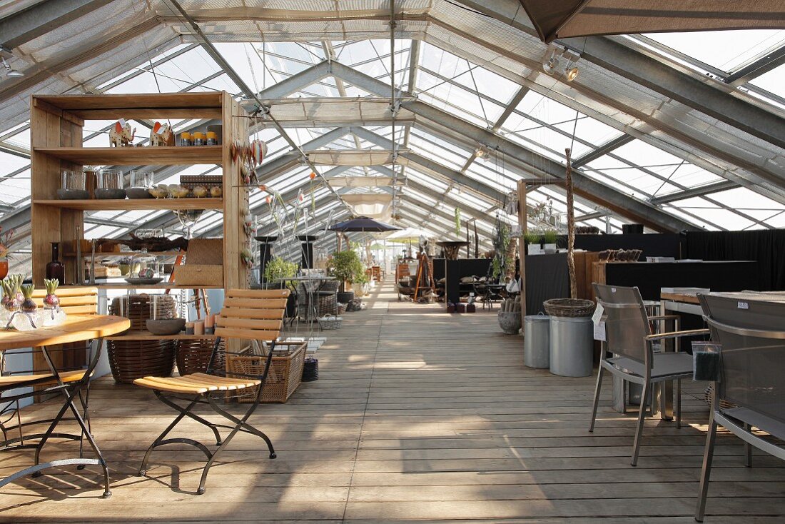 Converted greenhouse with dining area in foreground
