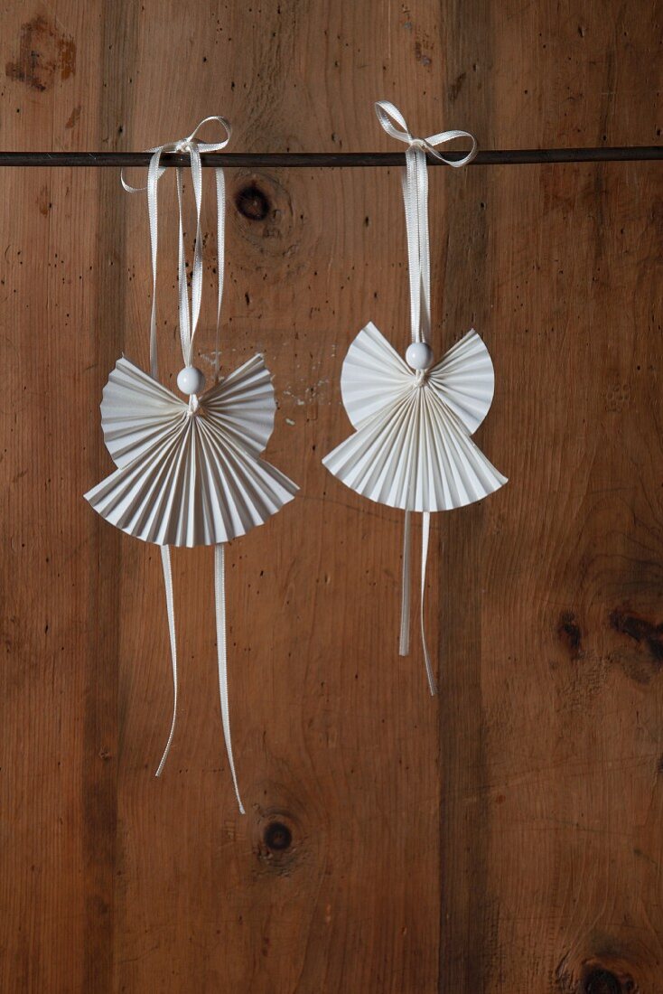 Angel pendants made from folded paper