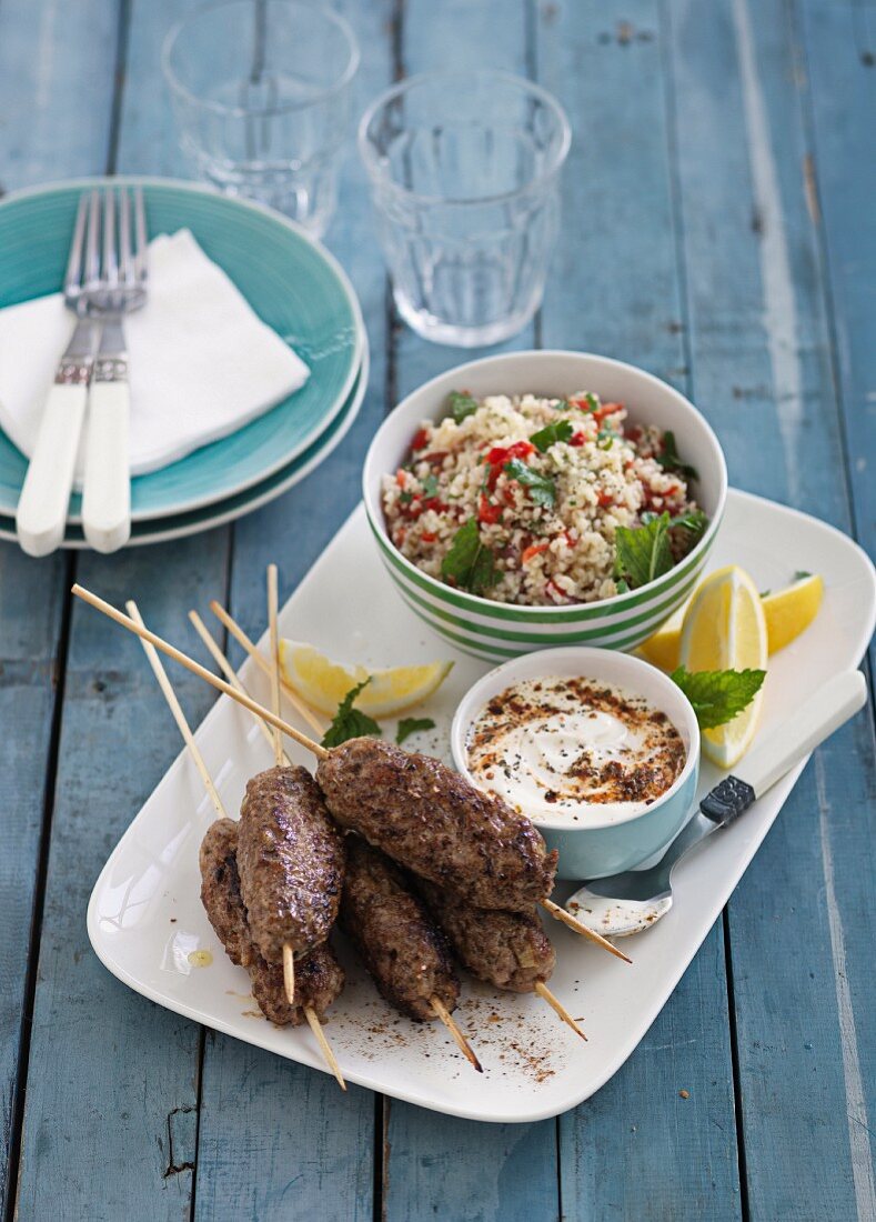 Pork kofta with couscous salad and a yoghurt dip