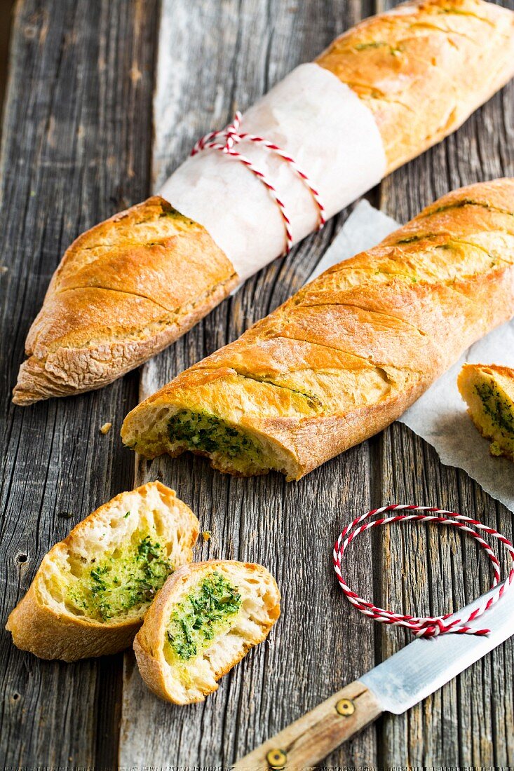 Baguettes with homemade herb butter for a barbecue